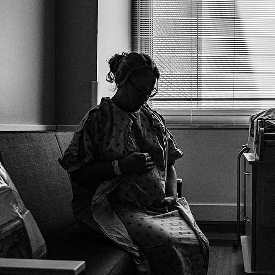 Pregnant mother in hospital waiting to be induced