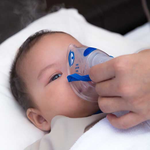 Baby being given oxygen