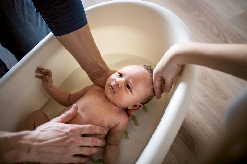 Giving an shop infant a bath