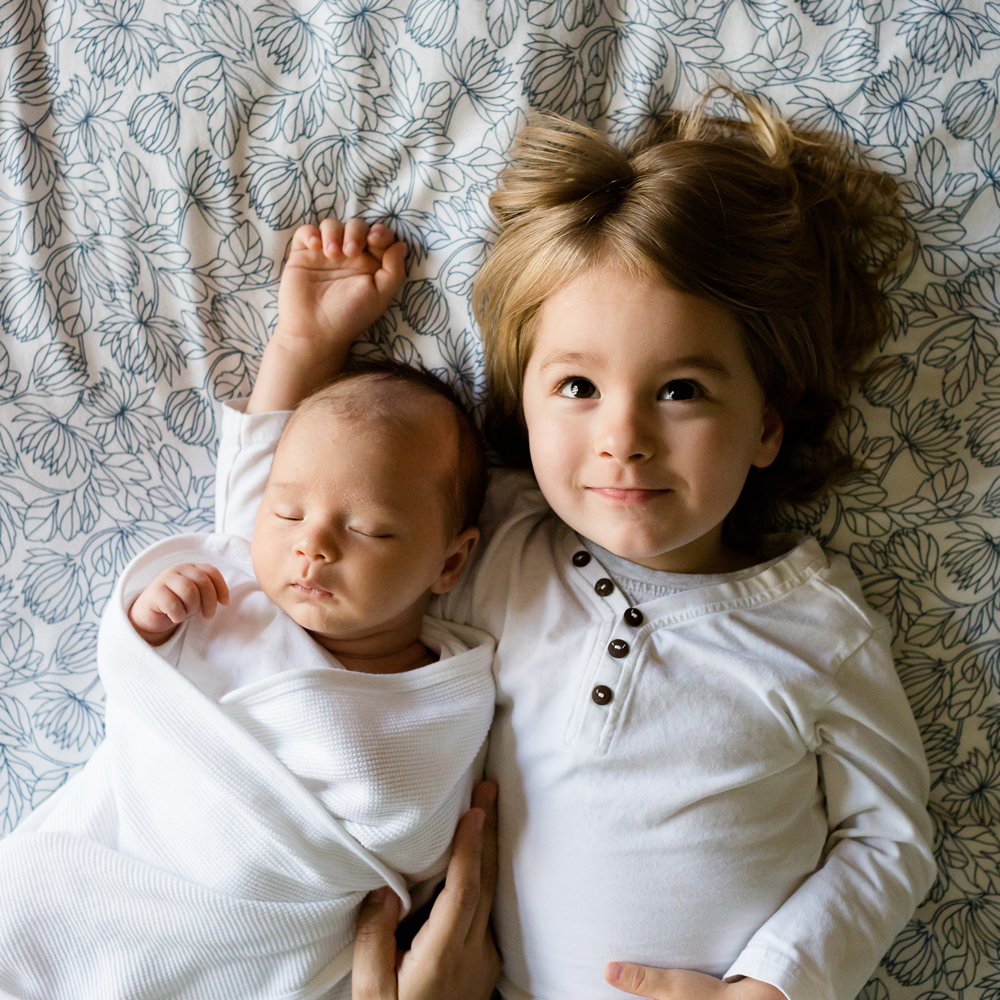 Newborn toddler siblings