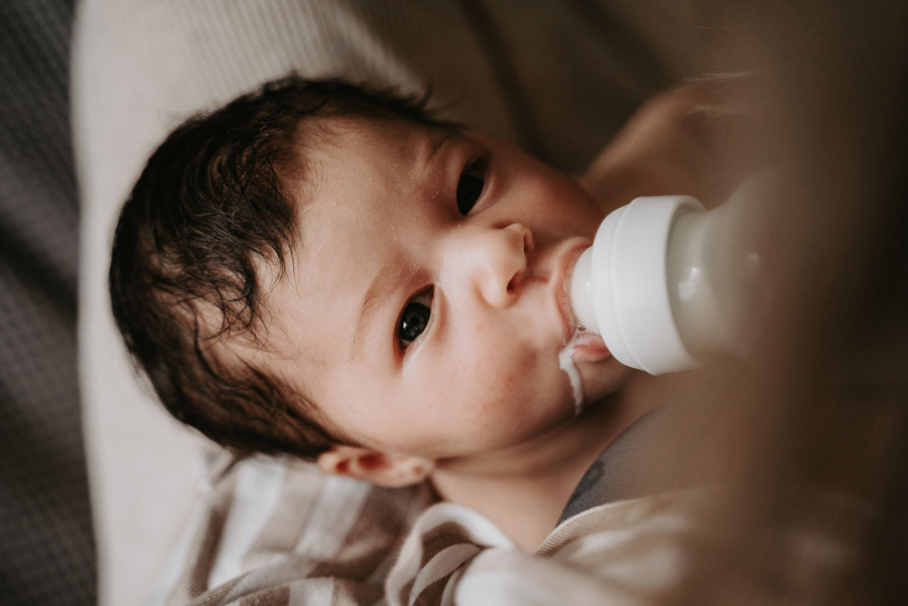 Baby having a bottle feed