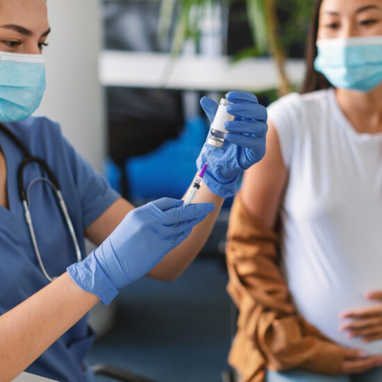 Pregnant woman receives COVID-19 vaccine