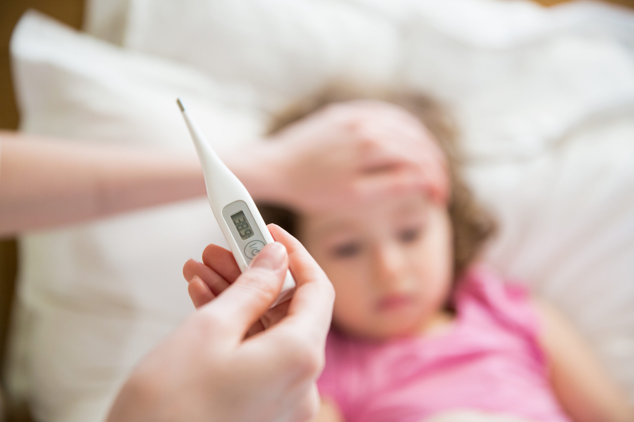 Child with shop thermometer